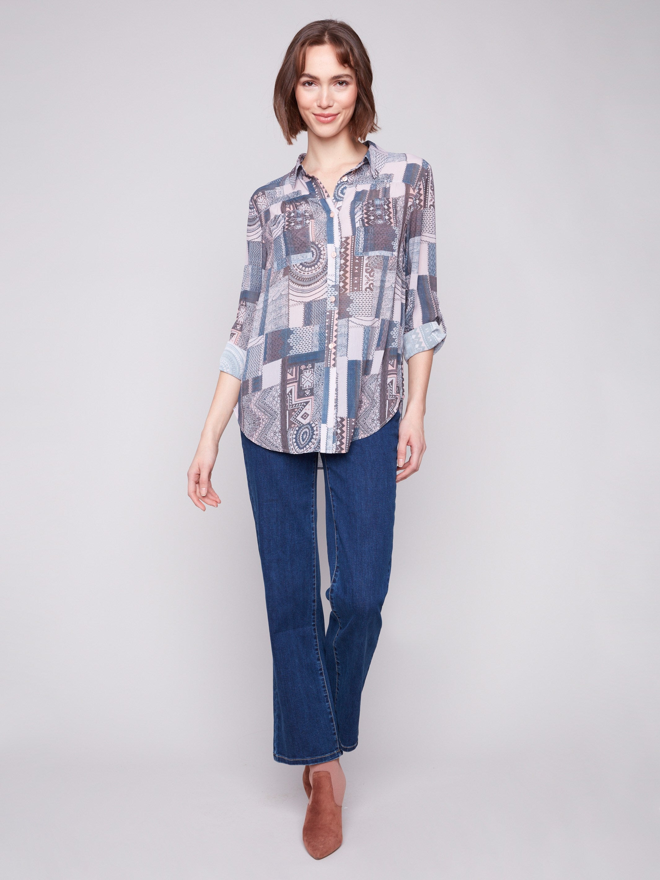 Elegant patchwork blouse with a classic shirt collar and button-down design for timeless appeal by Charlie B.
