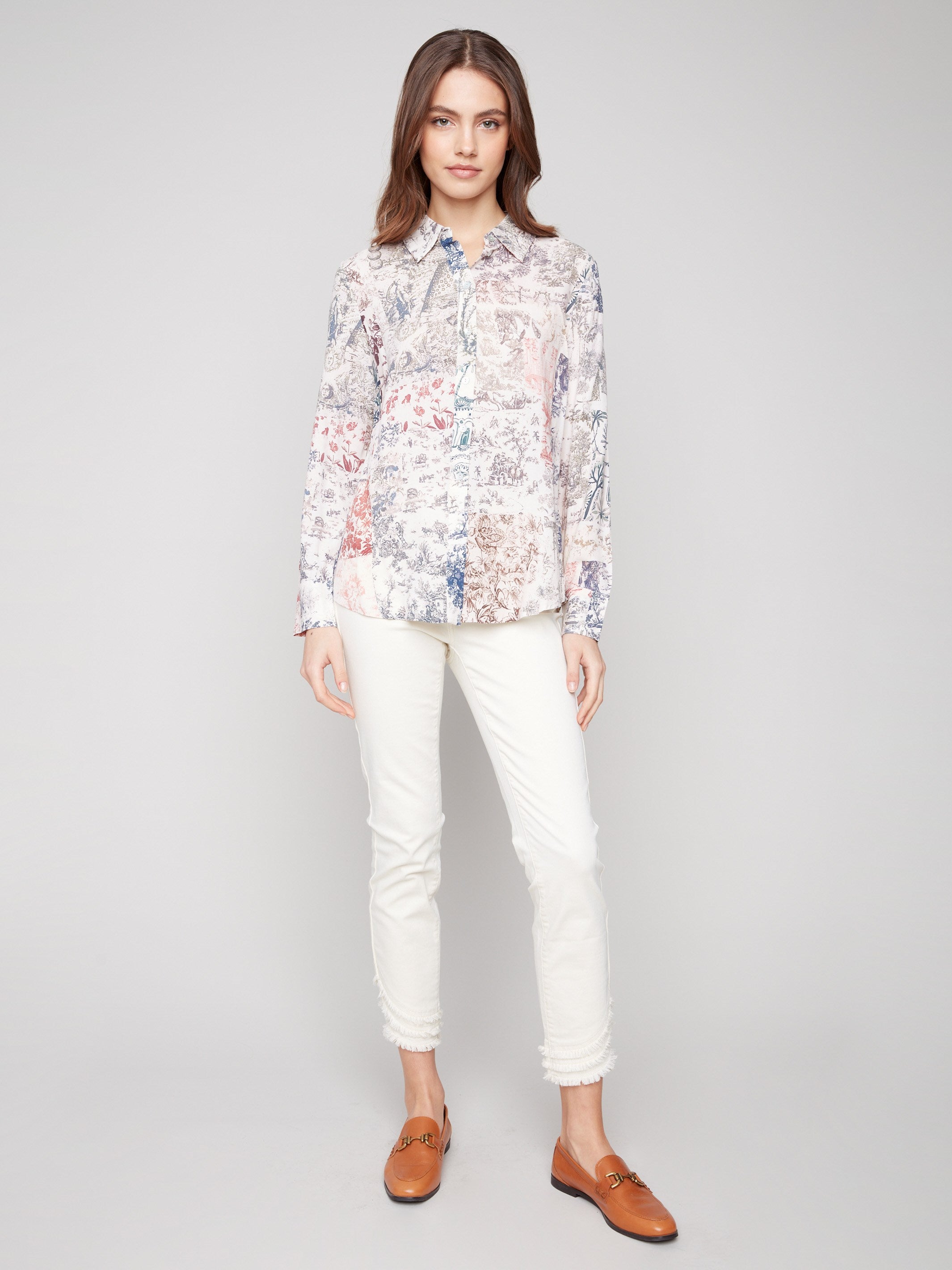 Long sleeve shirt with intricate toile patterns featuring button-down design and foldable cuffs by Charlie B.