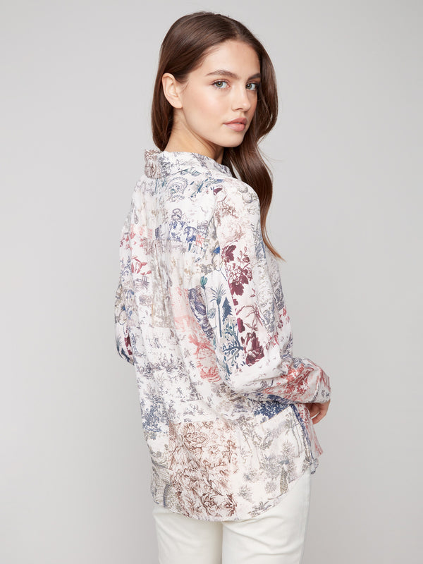 Long sleeve shirt with intricate toile patterns featuring button-down design and foldable cuffs by Charlie B.