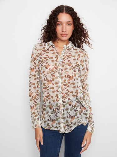 The sophisticated shirt collar enhances the timeless appeal of this semi-sheer blouse by Charlie B.