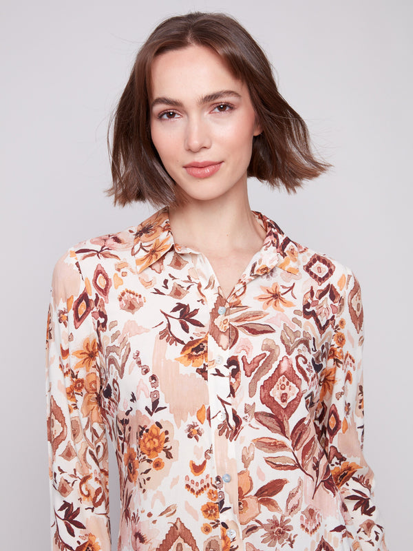 Long sleeve shirt with intricate geometric patterns in brown and cream shades, featuring button-down design and foldable cuffs by Charlie B.