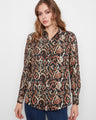 Patterned shirt with a classic collar and button-front closure, offering versatile styling options by Charlie B.