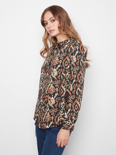 Stylish long-sleeve shirt made from lightweight fabric, perfect for any season by Charlie B.