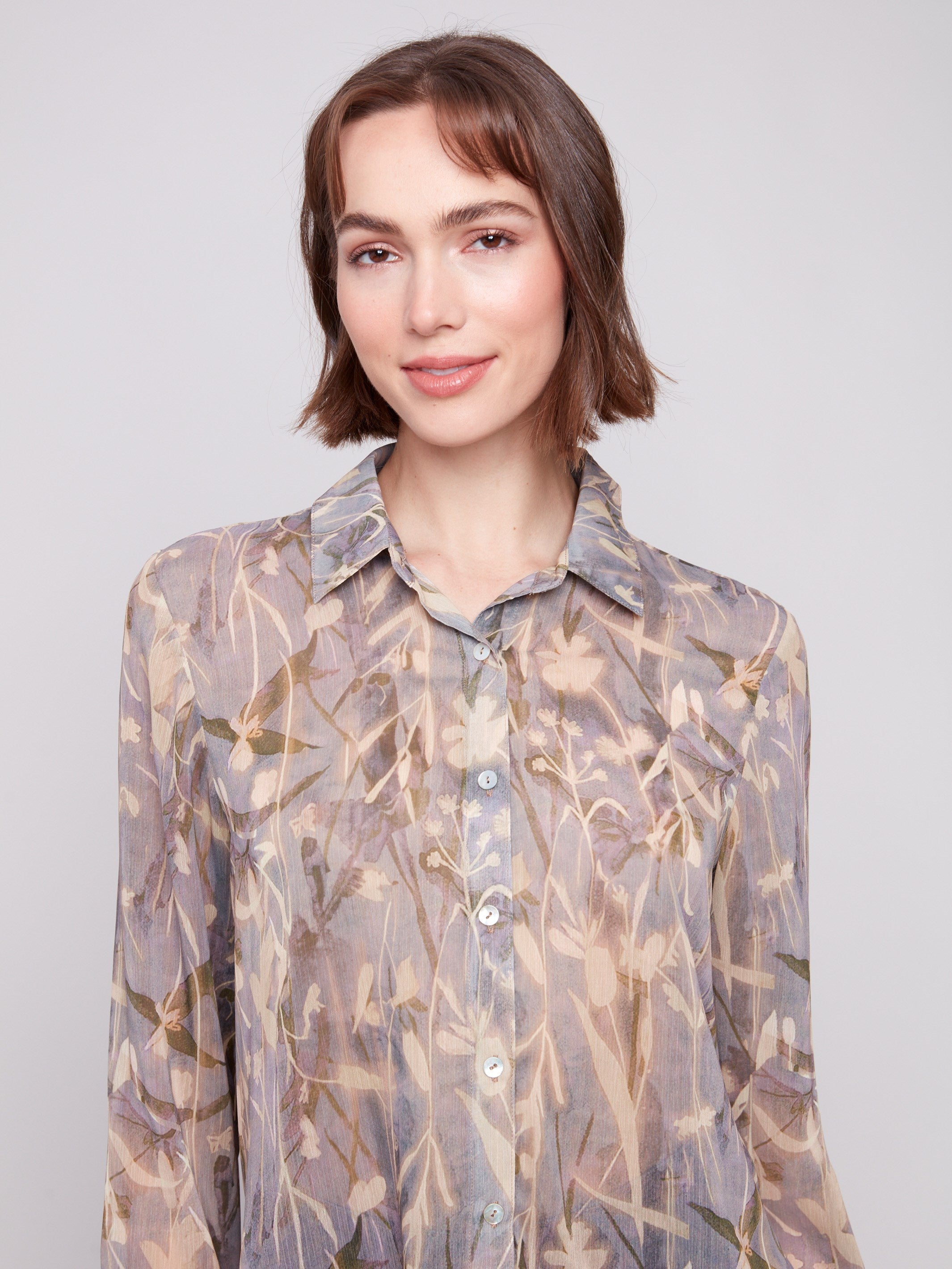 Long sleeve chiffon shirt with delicate floral patterns and a stylish collar design by Charlie B.