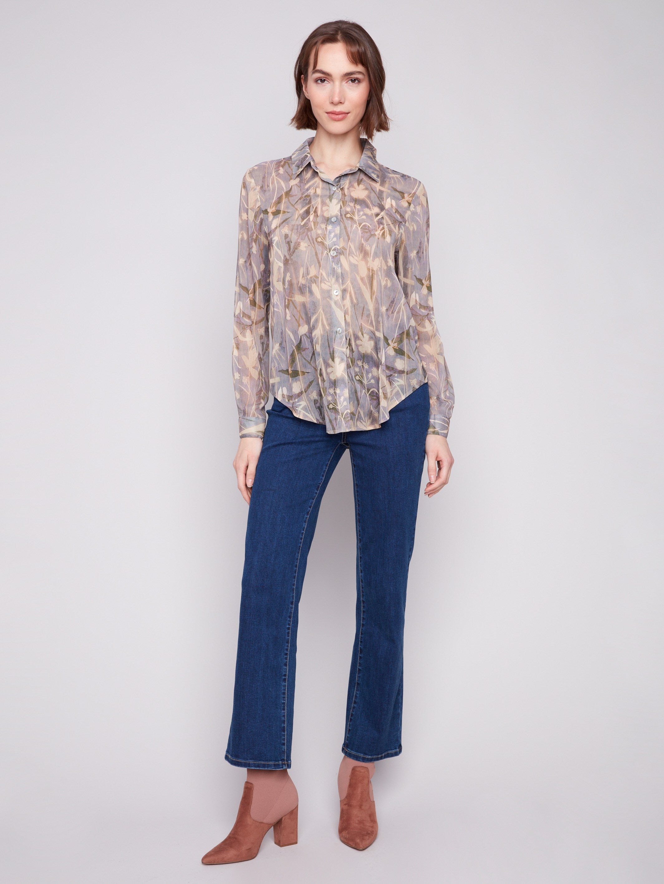 Elegant floral chiffon shirt offering versatile styling options; perfect for any occasion by Charlie B.