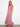 This versatile red floral maxi is designed to provide both elegance and ease of movement. By Charlie B.