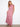 A stunning combination of color and style in this captivating red floral maxi dress by Charlie B.