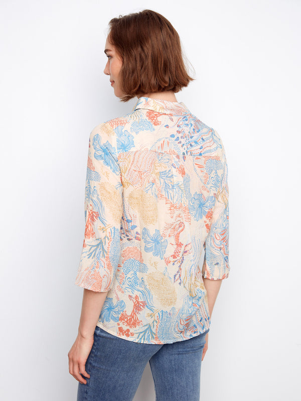 Coraline printed blouse with adjustable roll-up sleeves, ideal for adapting to different occasions effortlessly by Charlie B.