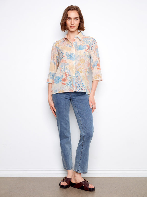 Cotton blend blouse showcasing a unique abstract pattern and shirt collar elegance by Charlie B.