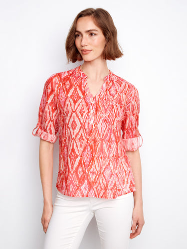 Tidevine patterned blouse with adjustable roll-up sleeves, ideal for versatile styling options by Charlie B.