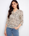 Floral blouse with a convenient chest pocket, perfect for casual outings and adding a touch of style to your wardrobe by Charlie B.