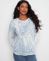 Elegant patterned sweater featuring a classic crew neckline, crafted from 100% cotton for ultimate comfort. By Charlie B.