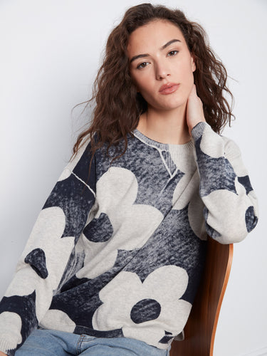 Graphic print crew neck sweater emphasizing the soft texture of 100% cotton fabric by Charlie B.