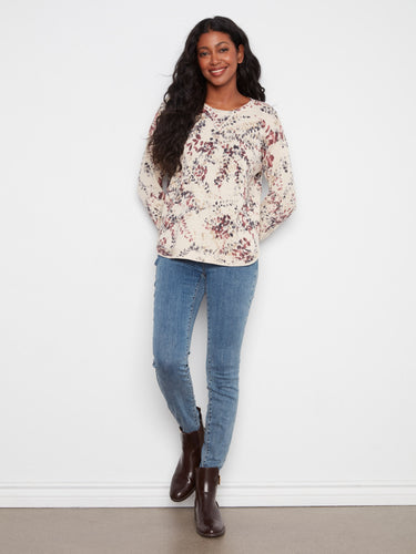 The drop shoulders on this floral top provide a relaxed fit, perfect for casual wear. Crafted in soft cotton by Charlie B.