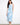 This dress features a classic crew neckline, offering a timeless and elegant look for any occasion. Crafted by Charlie B.