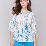 Blouse featuring a Mao collar and vibrant print by Charlie B.
