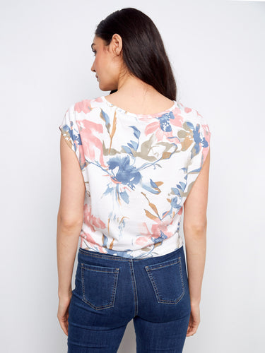 Chic floral pattern on this top highlights the crew neckline and soft fabric, perfect for any occasion by Charlie B.