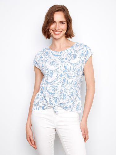 Soft blue patterned top with cap sleeves and a charming front tie knot detail. Crafted from pure cotton for style by Charlie B.