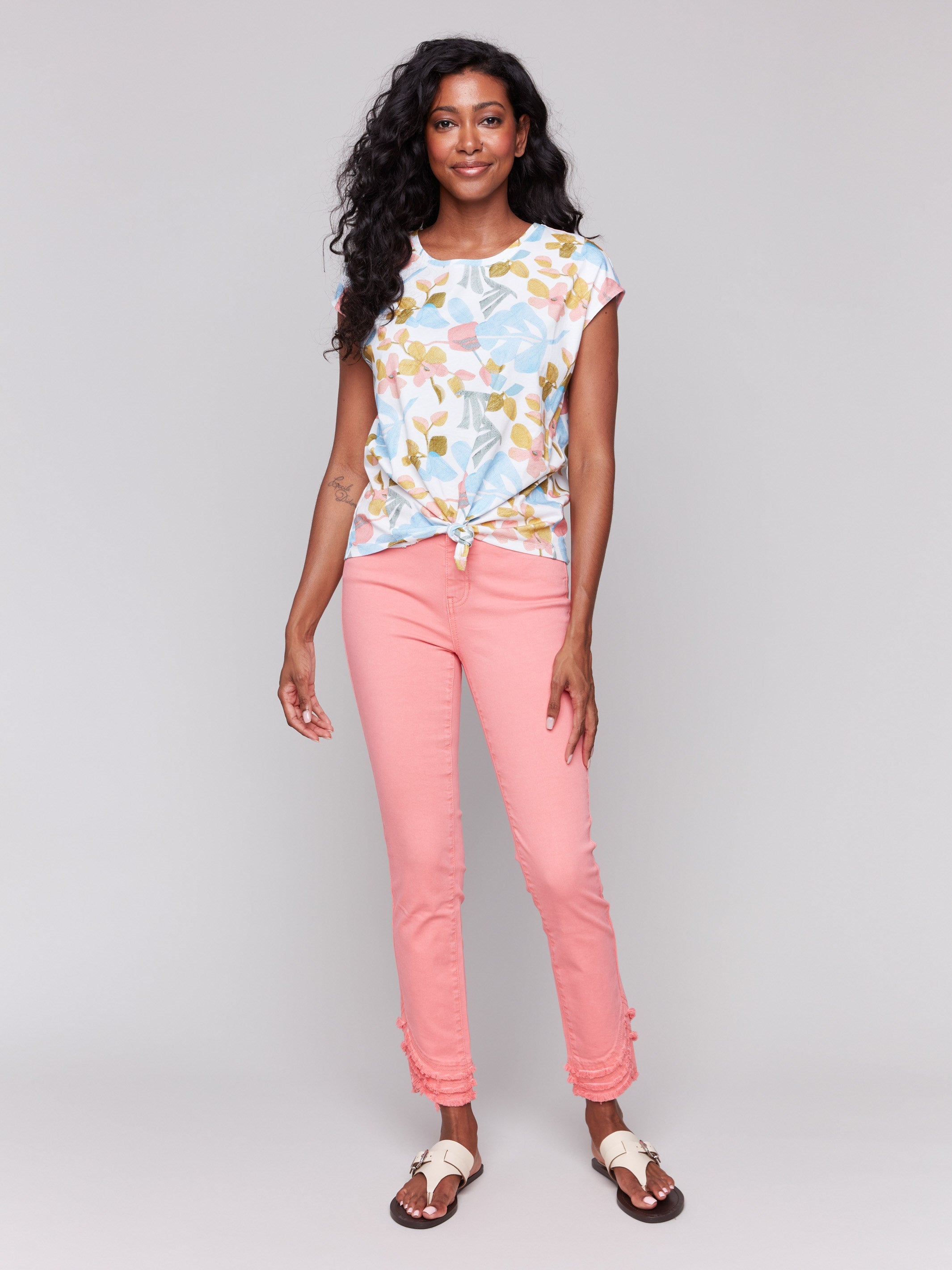 Cotton top with vibrant floral prints and a front knot detail by Charlie B.