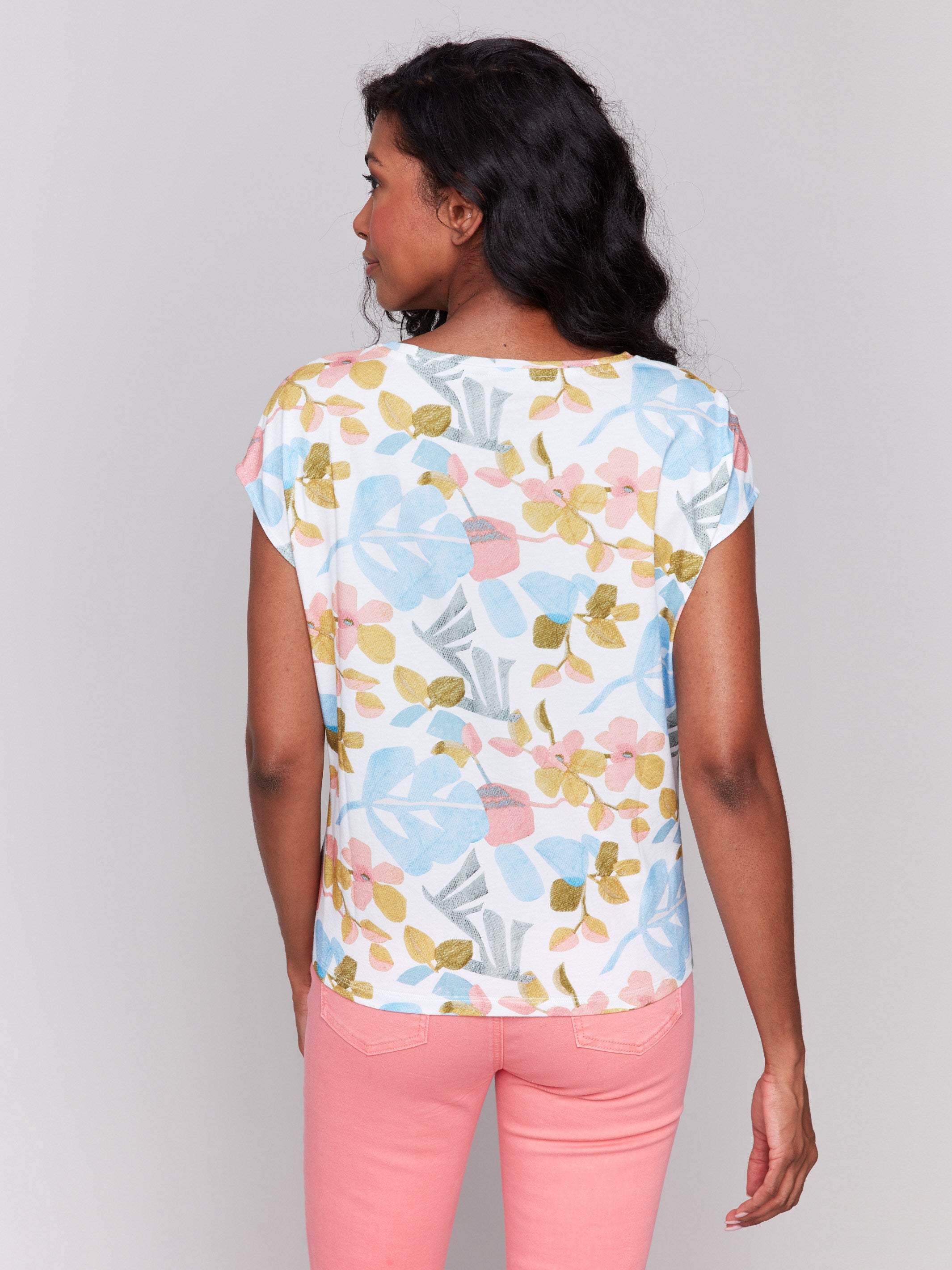 Cotton top with vibrant floral prints and a front knot detail by Charlie B.