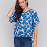 Tennis printed blouse with a crew neck by Charlie B.