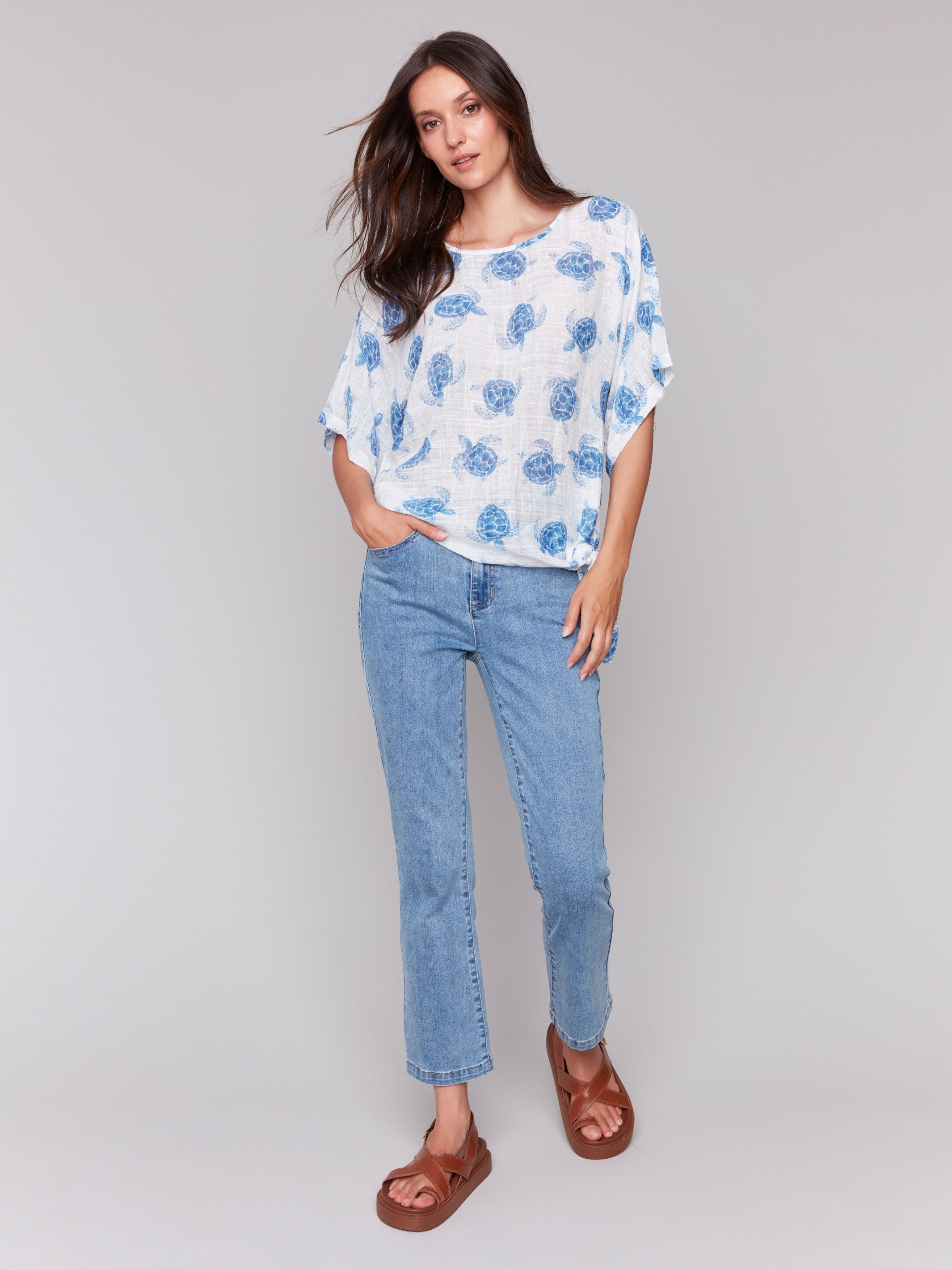Turtle patterned blouse featuring side tie detail by Charlie B.