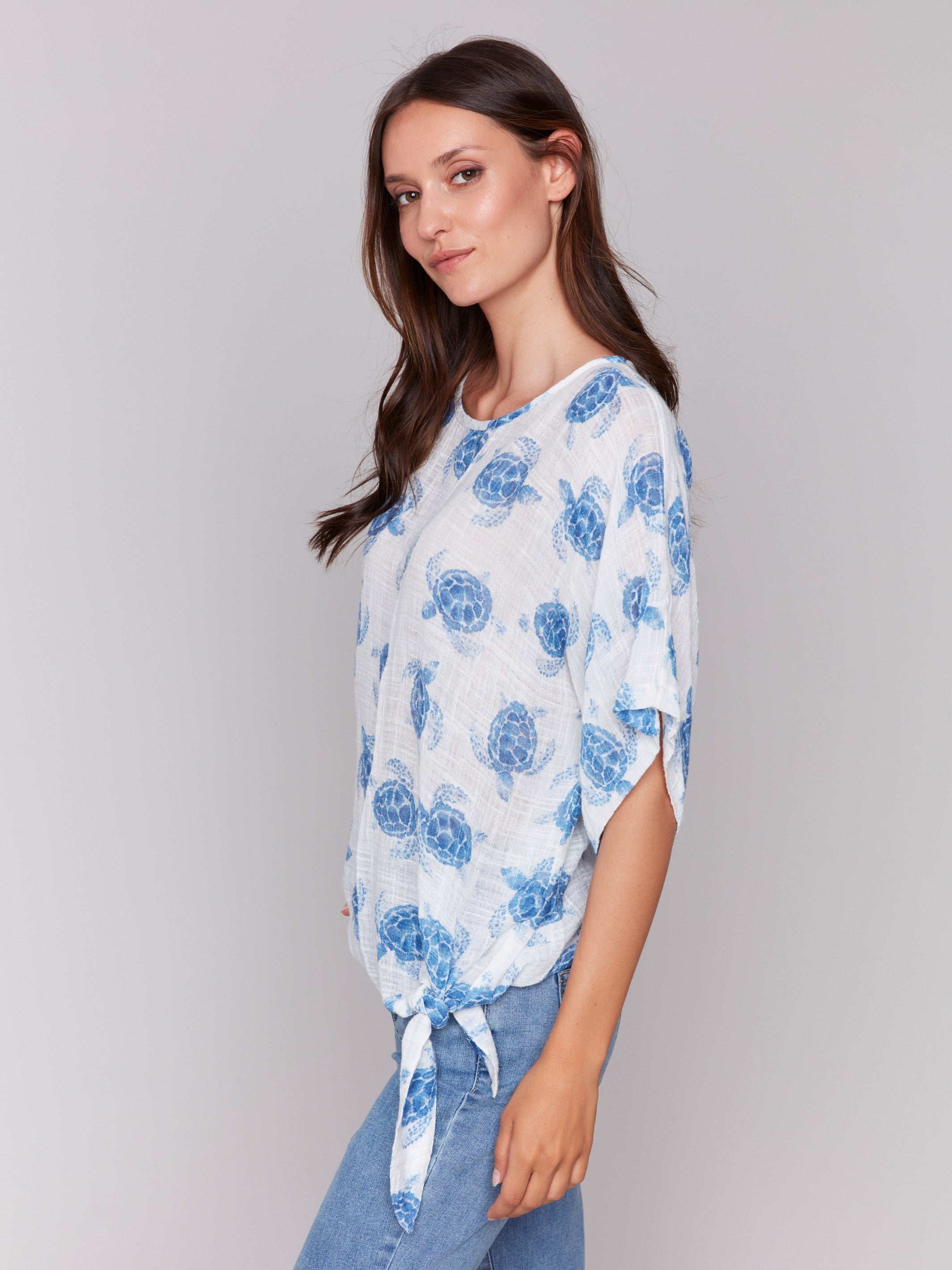 Stylish blouse with intricate turtle design by Charlie B.