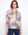 Floral shirt featuring a classic button-up style with vibrant patterns for a lively look. By Charlie B.