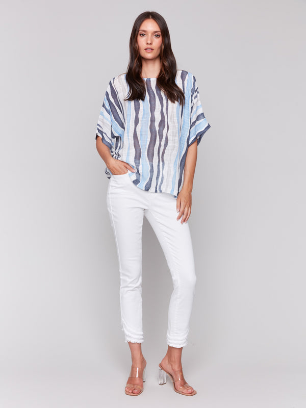 Blouse featuring short dolman sleeves in a striped pattern by Charlie B.