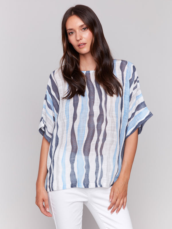 Striped pattern top with unique design elements by Charlie B.