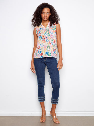 Floral sleeveless top featuring a half-button front, perfect for warm weather and casual outings by Charlie B.