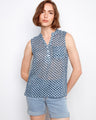 Geometric print blouse with a stylish Henley neckline, featuring a half-button front for versatile wear by Charlie B.