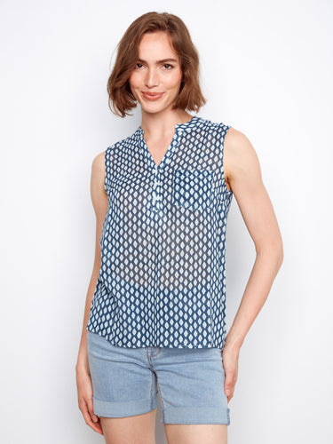 Trendy top with a half-button front, perfect for layering or wearing on its own by Charlie B.