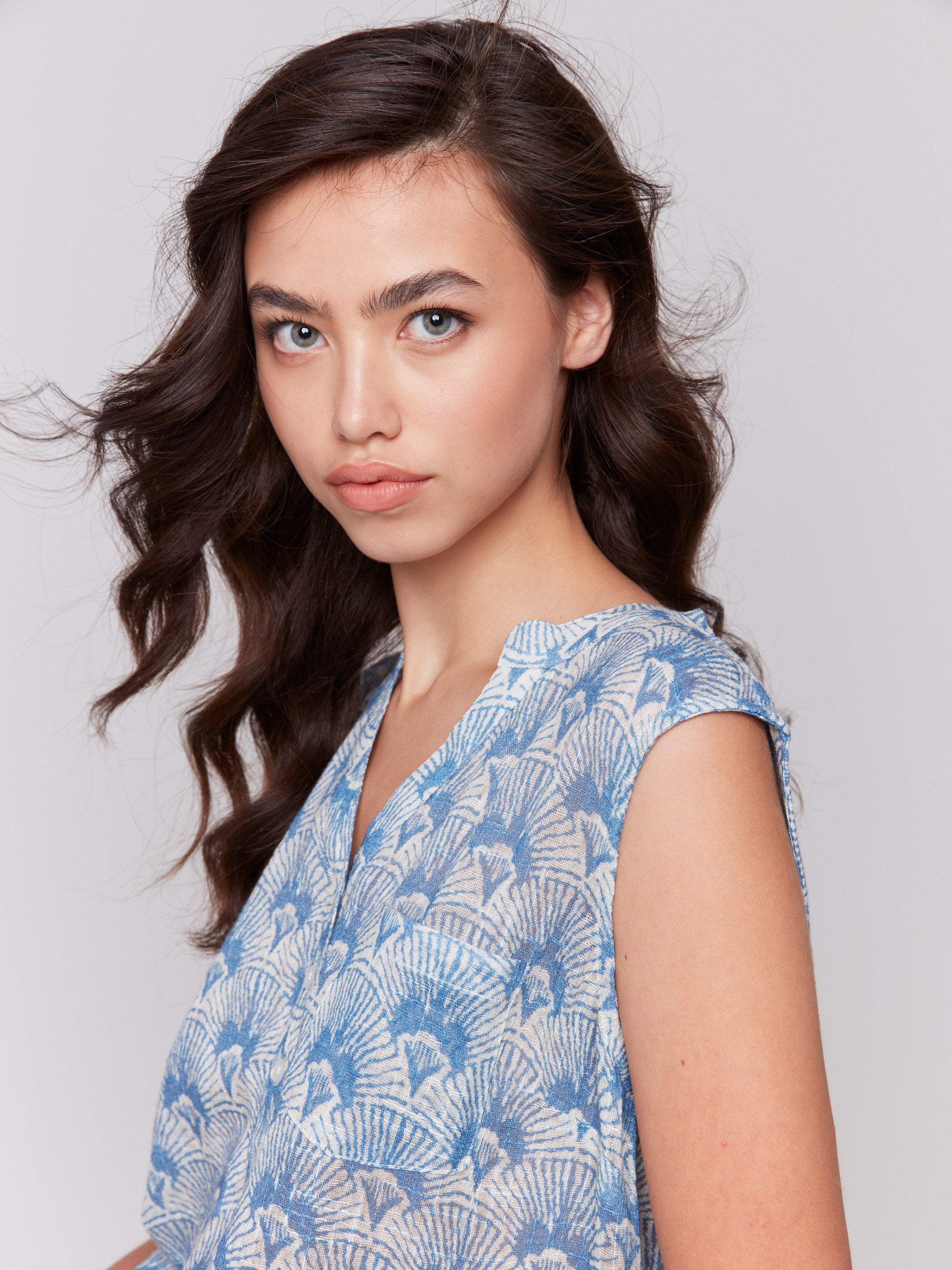 High-low hem sleeveless top in a tapestry design by Charlie B.