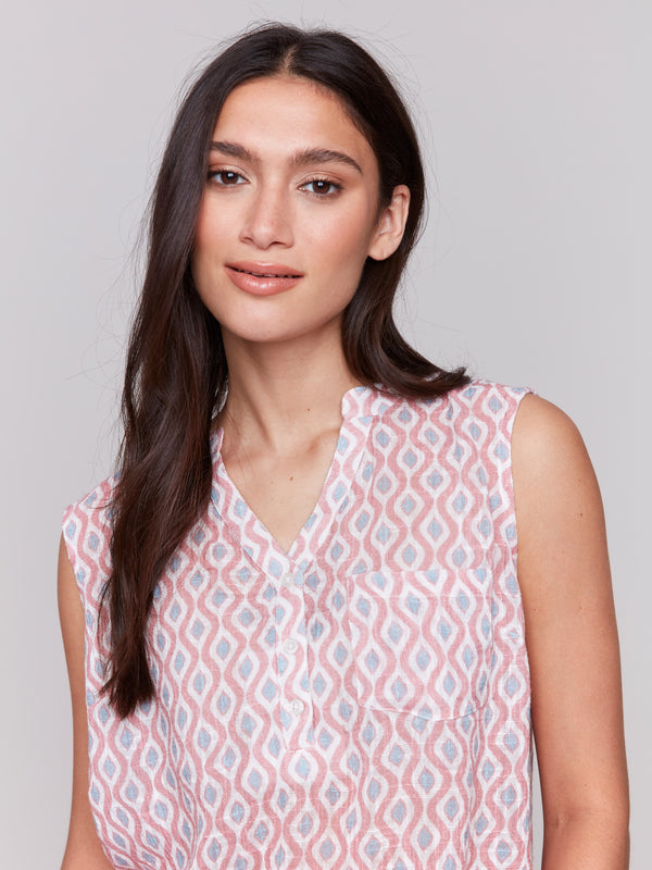 High-low hem cotton gauze top featuring a sleeveless design by Charlie B.