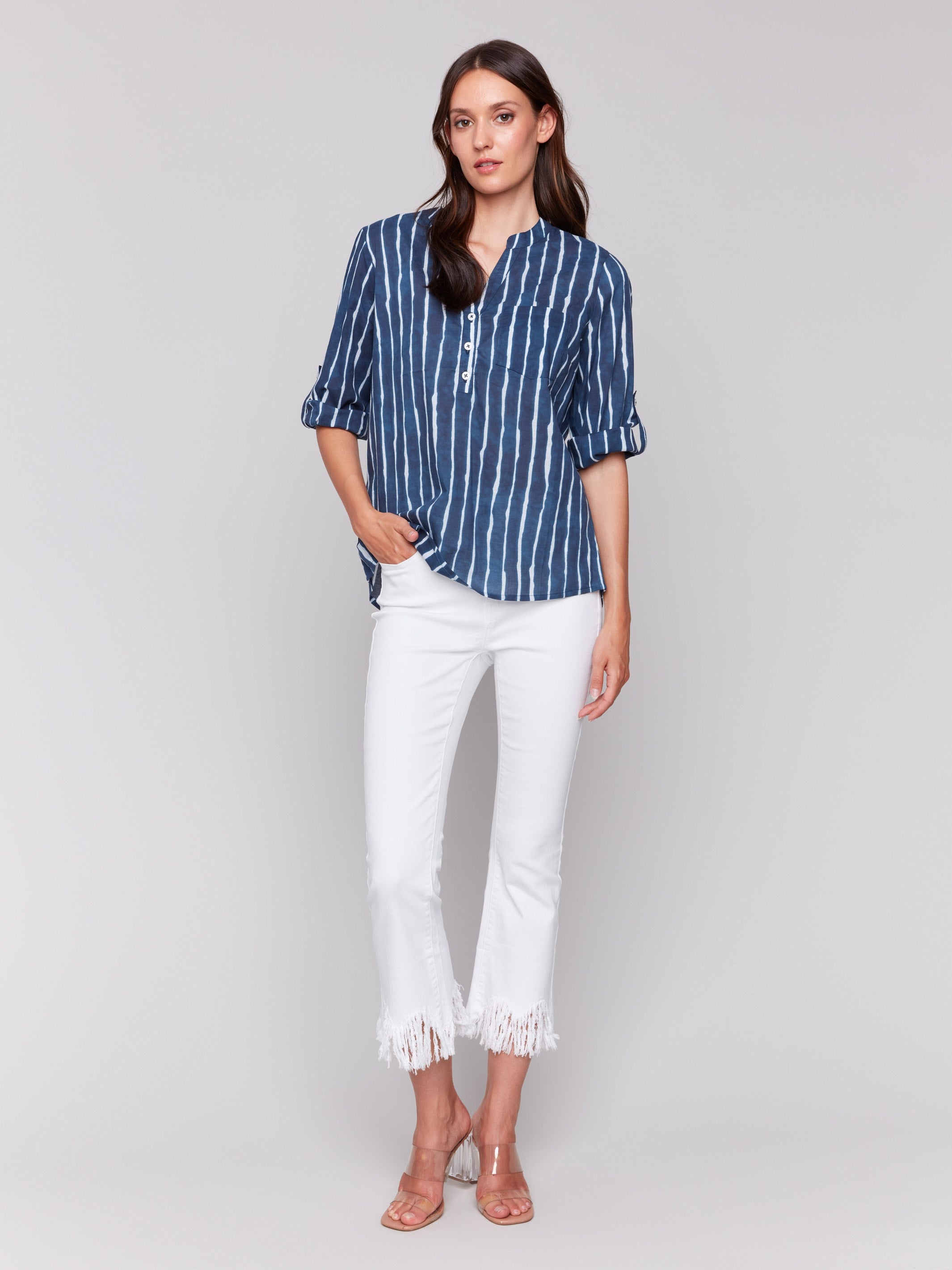 Indigo blouse featuring a half-button front design by Charlie B.