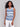 Blue and white sleeveless tank top with knot detail at the hem by Charlie B.