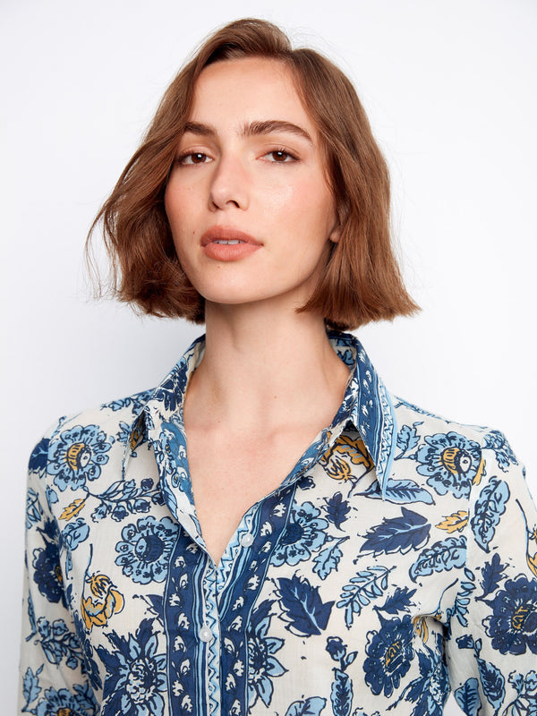 Featuring long sleeves, this floral top offers both coverage and breathability, suitable for various occasions year-round by Charlie B.