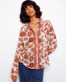 Floral printed blouse featuring a shirt collar and button-up closure, crafted from lightweight cotton by Charlie B.