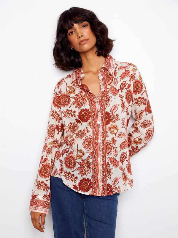 Floral printed blouse featuring a shirt collar and button-up closure, crafted from lightweight cotton by Charlie B.