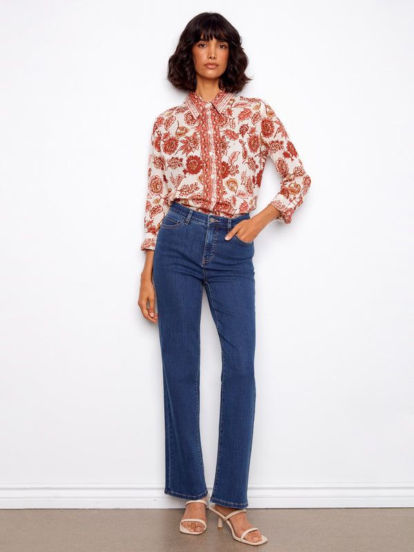 Chic floral pattern on this lightweight cotton blouse, complete with tailored long sleeves by Charlie B.