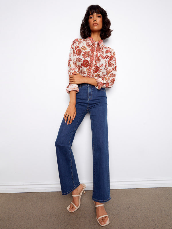 Floral print adds charm to this lightweight long sleeve blouse with tailored details for versatile wear by Charlie B.