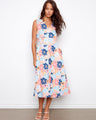 Floral dress featuring a stylish V-neck design, perfect for a casual day out or a special occasion. By Charlie B.