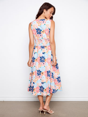 The dress includes hidden pockets, offering practicality without compromising on style and charm. By Charlie B.