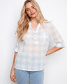 Plaid blouse featuring a chest pocket and roll-up sleeves, perfect for casual wear by Charlie B.