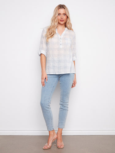 Stylish plaid blouse with a half-button design and comfortable fit by Charlie B.