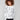 White sweater with black cheetah print showcasing a stylish crew neck design, perfect for casual outings by Charlie B.