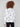 Chic white sweater displaying black cheetah patterns and crafted with attention to detail, offering timeless style by Charlie B.