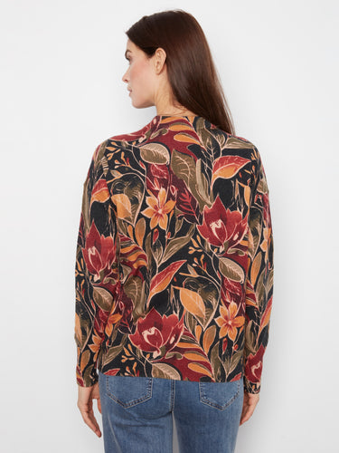 Back view of the colorful floral sweater with its comfortable crew neckline and relaxed fit. By Charlie B.