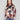 Sweater with a relaxed fit featuring an abstract floral design and sleeve zippers by Charlie B.